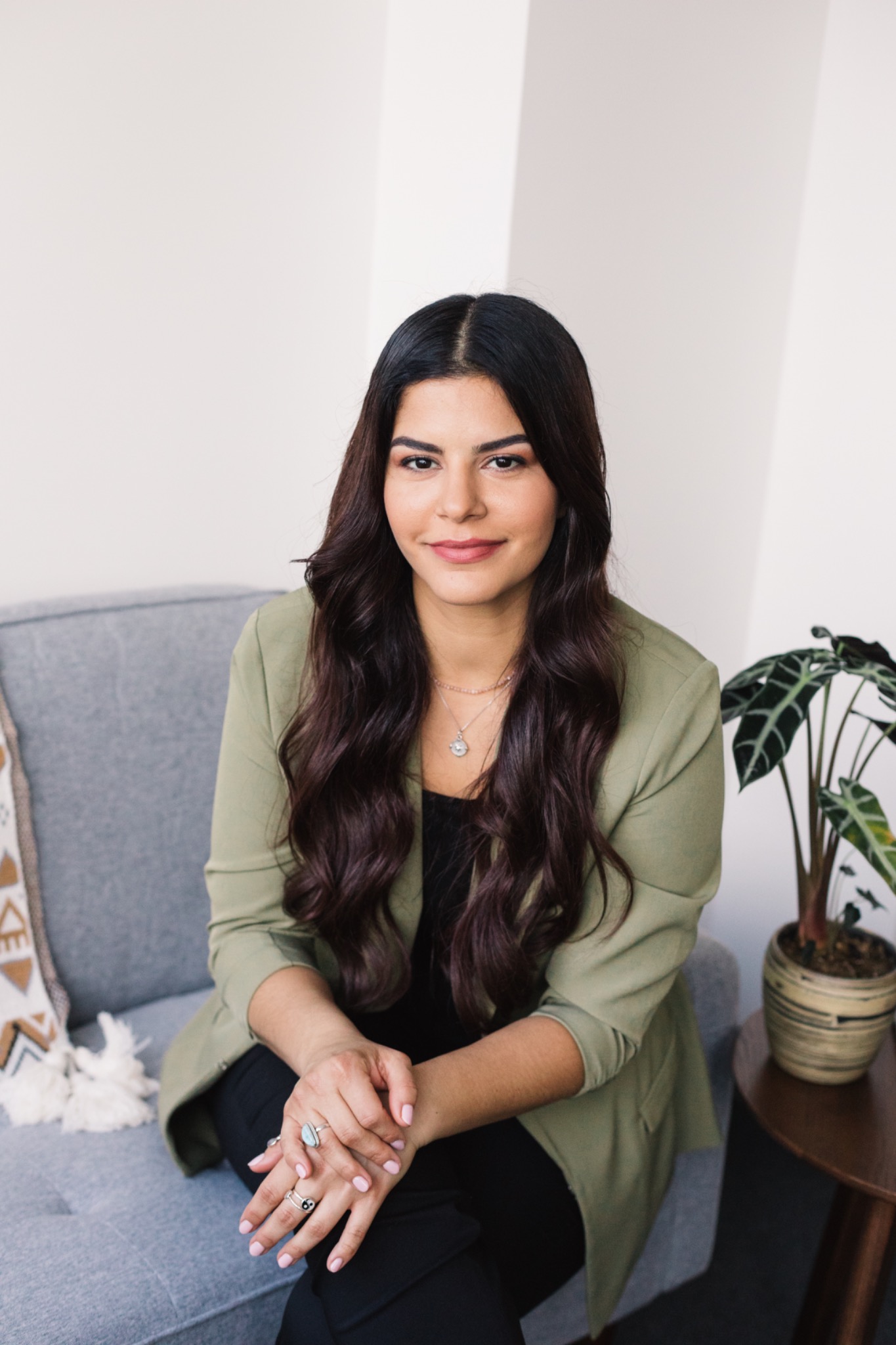 Bianca Istueta seated in her therapy office